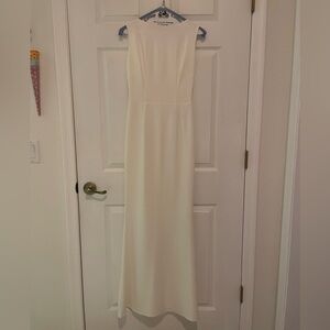Elegant Ivory Sleeveless Draped Back Gown